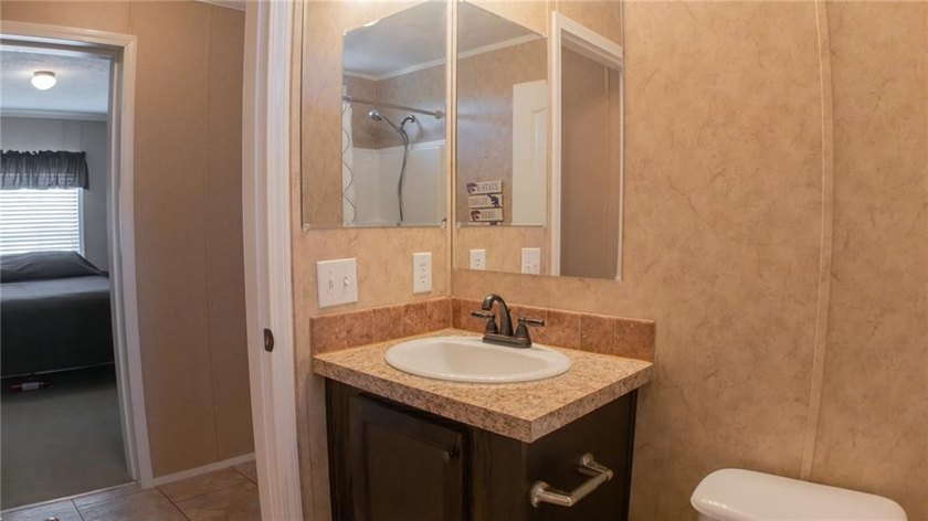 This charming 1,350 sq ft manufactured home sits on a permanent - photo 21