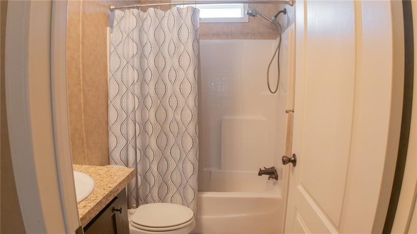 This charming 1,350 sq ft manufactured home sits on a permanent - photo 22