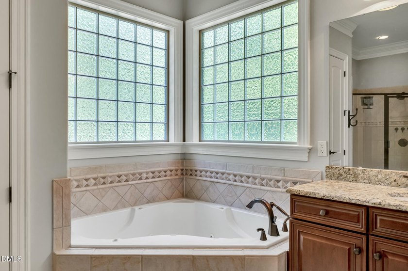 Nestled on a private, acre-plus, cul-de-sac homesite within the - photo 22