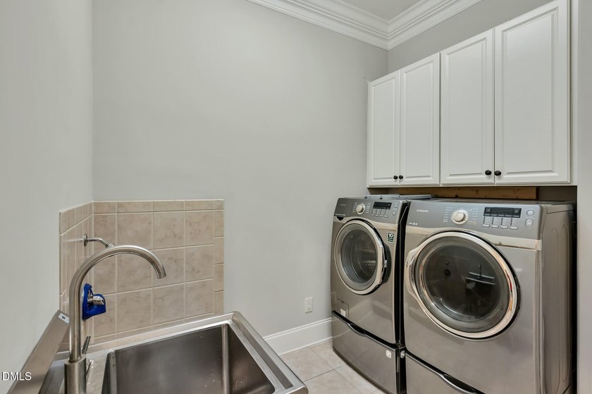 Nestled on a private, acre-plus, cul-de-sac homesite within the - photo 25