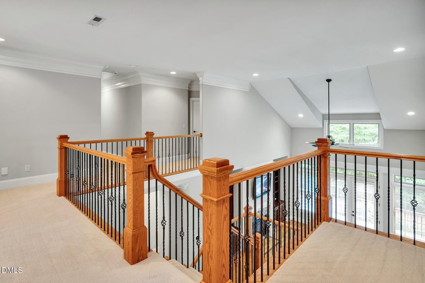 Nestled on a private, acre-plus, cul-de-sac homesite within the - photo 27