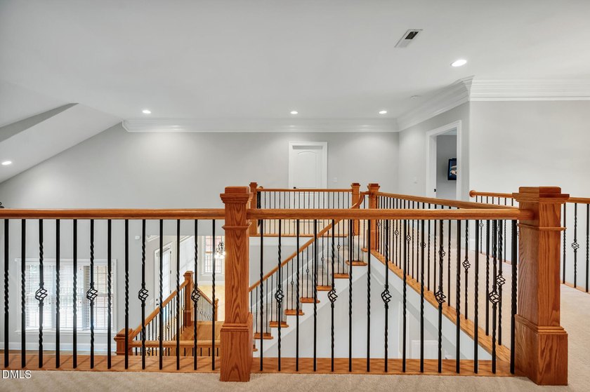 Nestled on a private, acre-plus, cul-de-sac homesite within the - photo 28