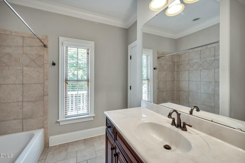 Nestled on a private, acre-plus, cul-de-sac homesite within the - photo 32