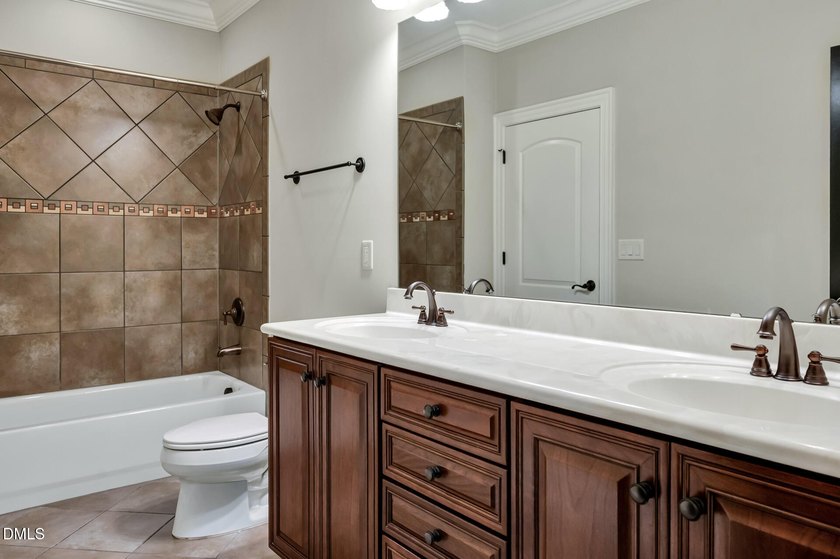 Nestled on a private, acre-plus, cul-de-sac homesite within the - photo 41
