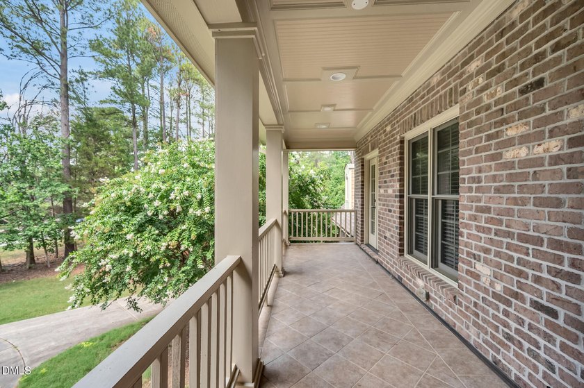Nestled on a private, acre-plus, cul-de-sac homesite within the - photo 46