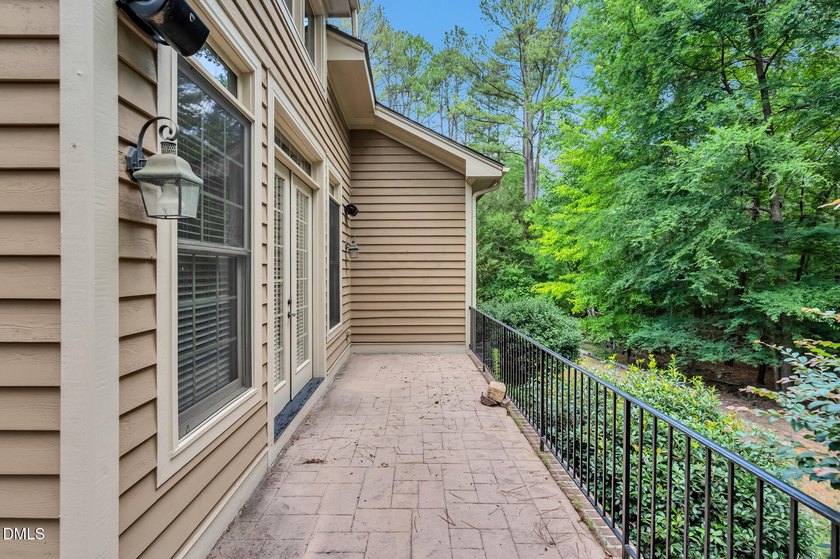 Nestled on a private, acre-plus, cul-de-sac homesite within the - photo 50
