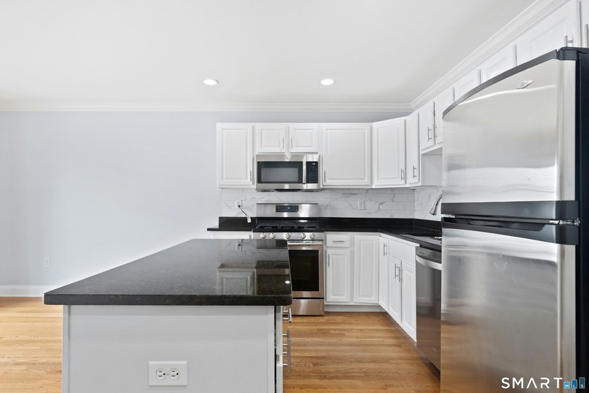 One of the largest townhomes in desirable Village River's Edge - photo 6