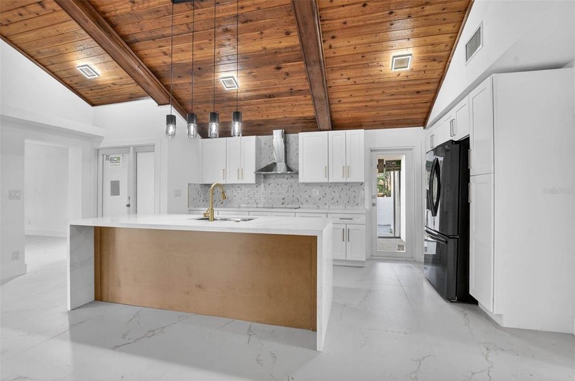 This STUNNING remodeled home is now offered for sale! The home - photo 8