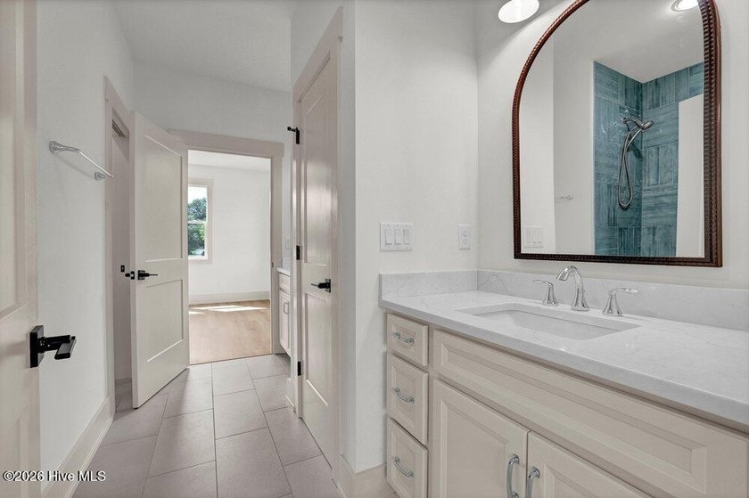 Experience elevated coastal living in this stunning new - photo 11