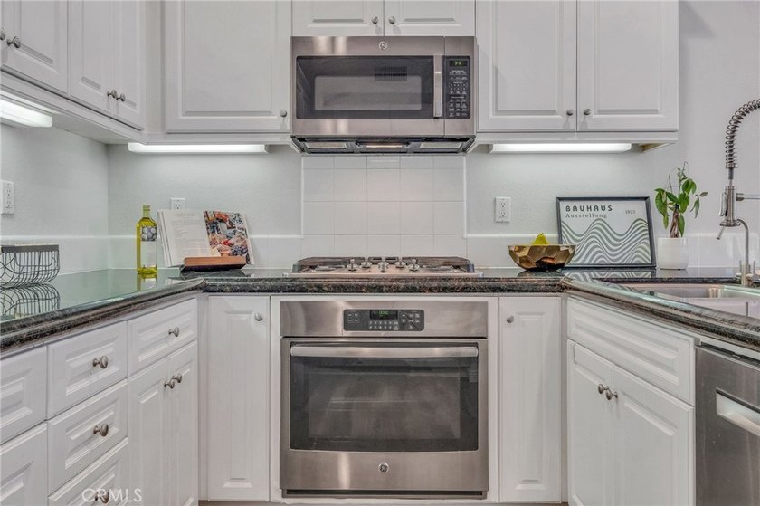 Inviting townhome in the gated Village on Oak community. Walk to - photo 13