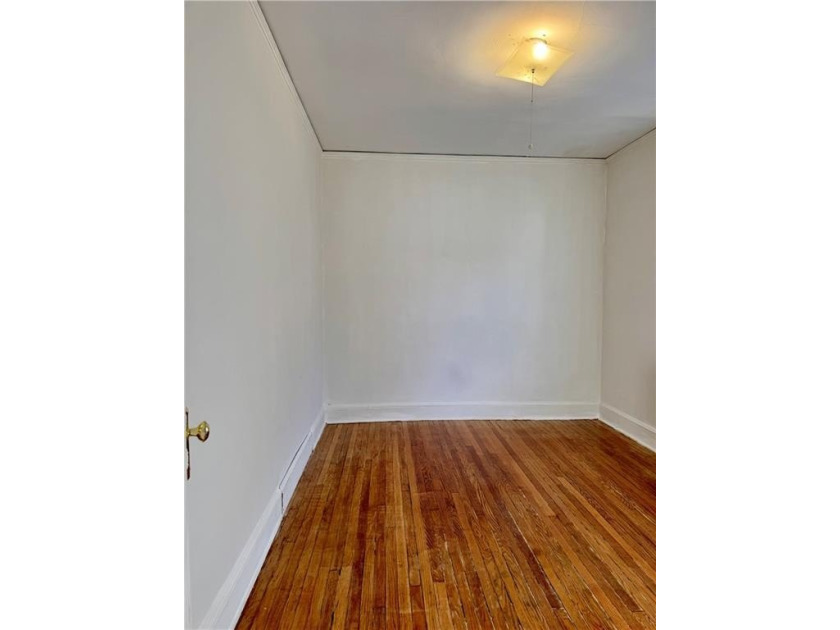 This exceptional 2-family side by side home, sits on a generous - photo 12