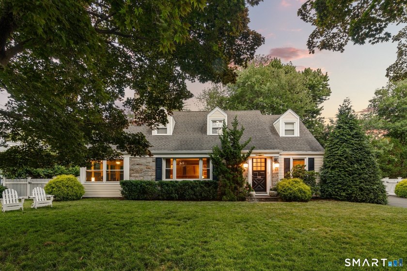 This classic New England Cape Cod is nestled just a short walk - photo 3