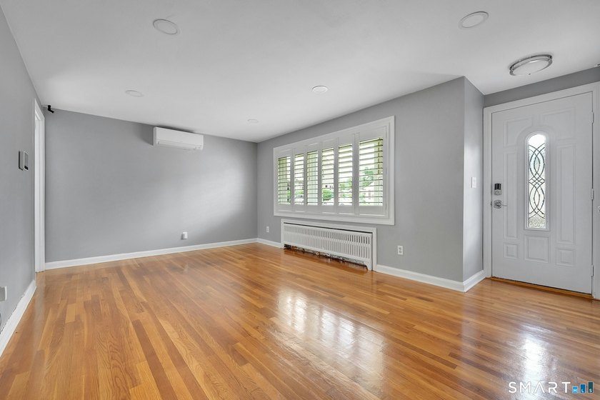 Beautifully updated and deceptively spacious, this move-in ready - photo 3