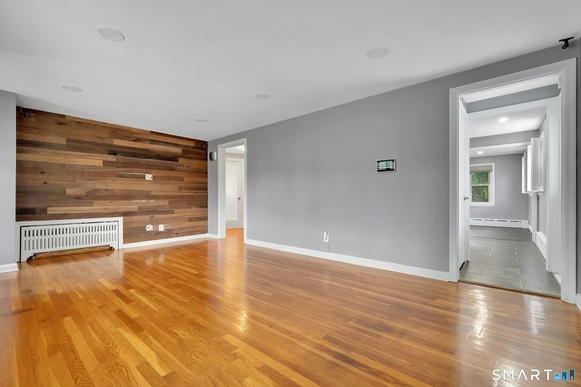 Beautifully updated and deceptively spacious, this move-in ready - photo 5