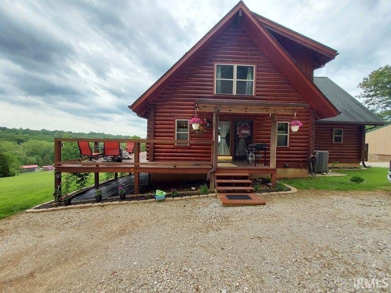 Situated on a picturesque hill on over 9 acres near Patoka Lake - photo 11