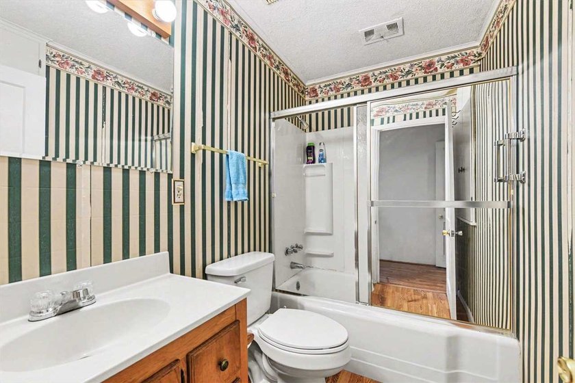 Nestled in a prime location, this charming home sits on an - photo 15
