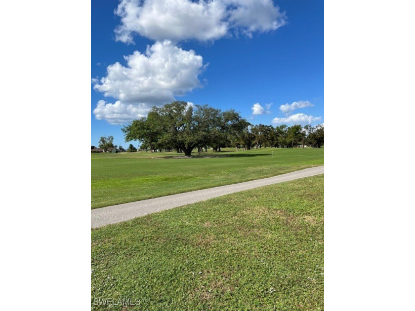 CORAL OAKS GOLF COURSE- Prime Residential Lot with an expansive - photo 6
