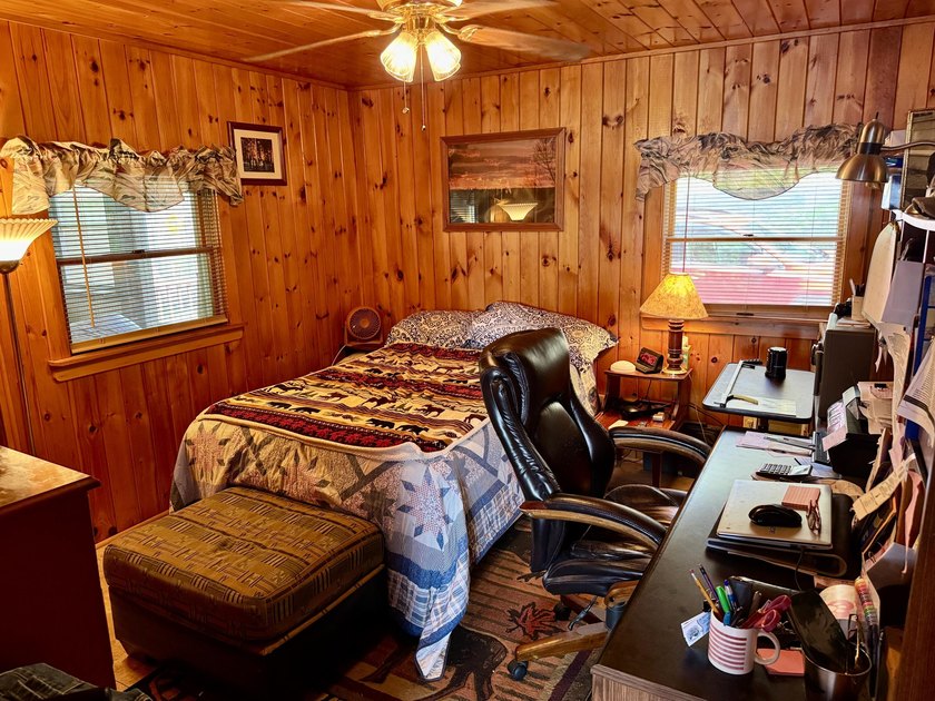Enjoy lake life in this 3 BR 2 bath waterfront home on pristine - photo 50