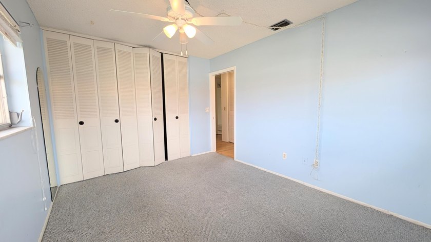 Welcome to this spacious 2-bedroom, 2-bath corner condo located - photo 14