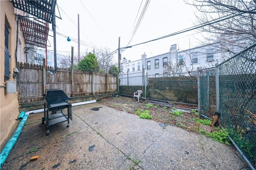 This is an excellent opportunity to own an oversized 3-family - photo 4