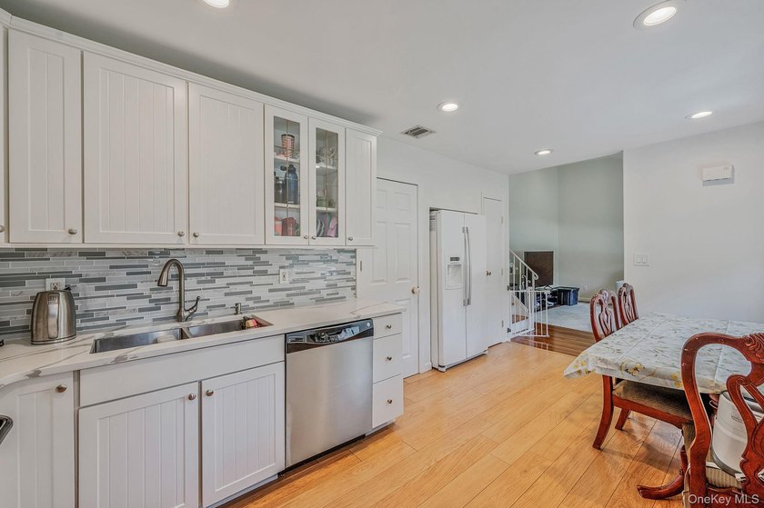 Welcome to this charming single-family split ranch nestled in a - photo 6