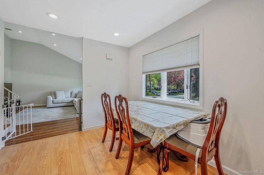 Welcome to this charming single-family split ranch nestled in a - photo 7