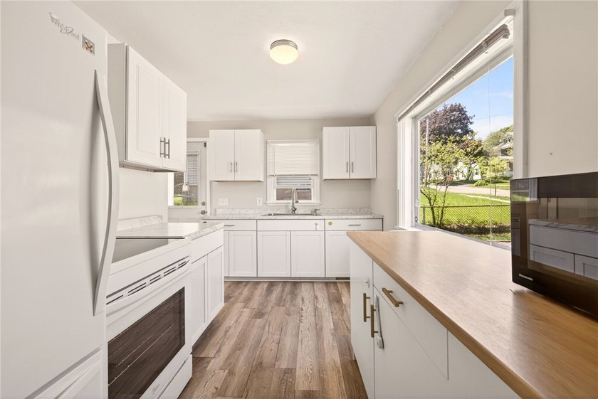 Welcome to 129 Wyndham, a move-in ready home offering the - photo 7