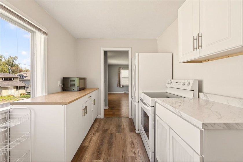 Welcome to 129 Wyndham, a move-in ready home offering the - photo 8