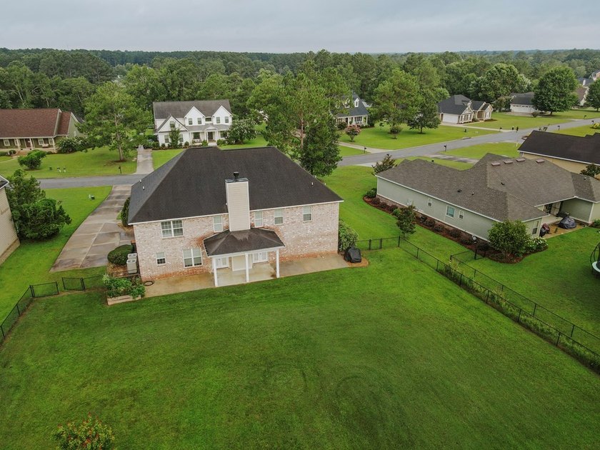 Welcome home to this stunning, light-filled brick residence - photo 50