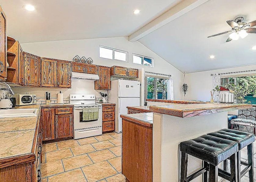 A rare gem, two completely remodeled elegant permitted home with - photo 7