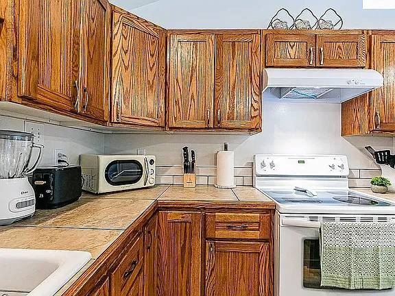 A rare gem, two completely remodeled elegant permitted home with - photo 8