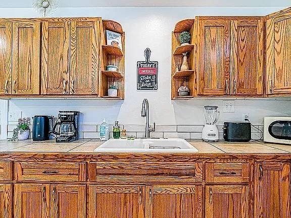 A rare gem, two completely remodeled elegant permitted home with - photo 9