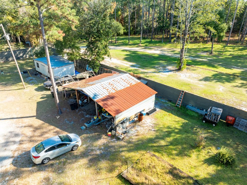 Legacy acreage now offered for sale, located South of the - photo 7