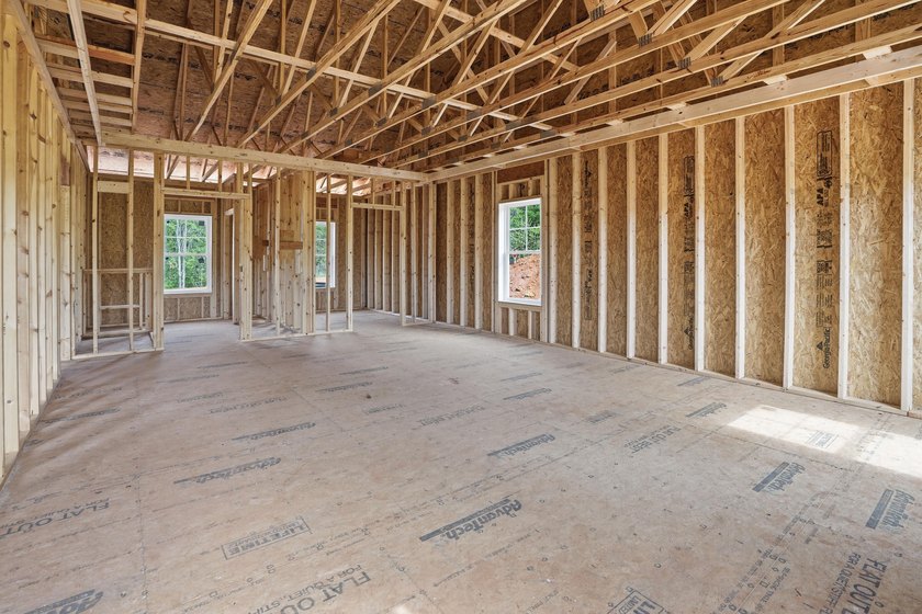 Quality new construction on a beautiful 1.7-acre corner lot! - photo 12