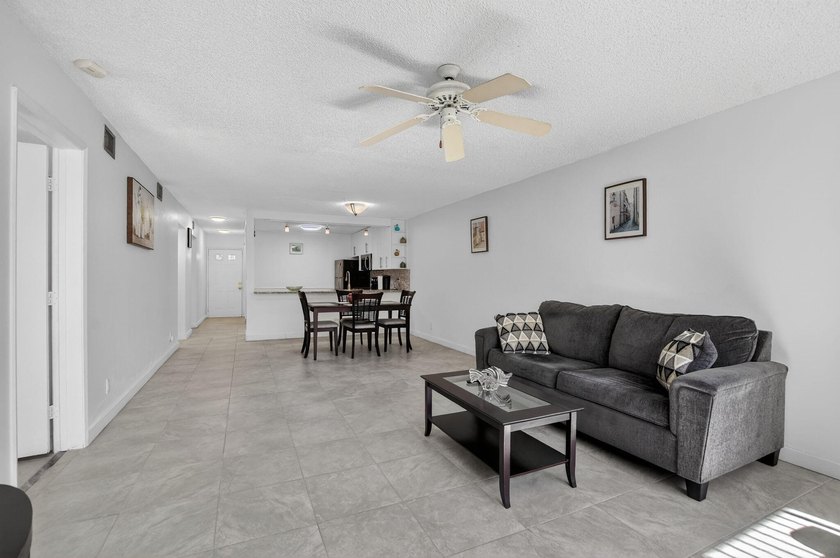 Fully updated 2/2 with 1-car garage! Features an open kitchen - photo 14