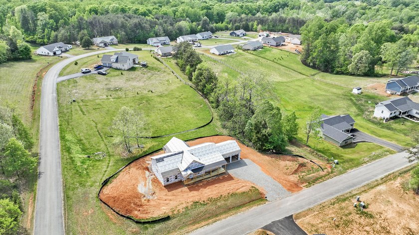 Quality new construction on a beautiful 1.7-acre corner lot! - photo 23