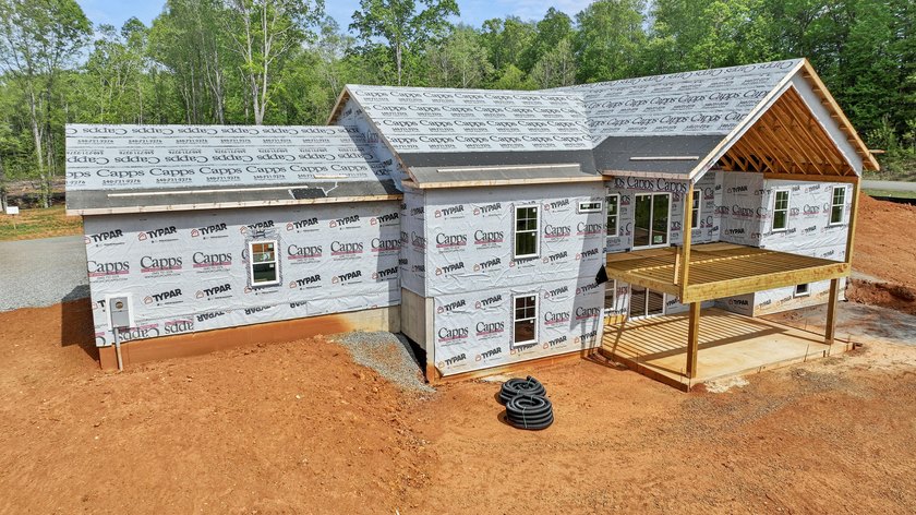 Quality new construction on a beautiful 1.7-acre corner lot! - photo 24