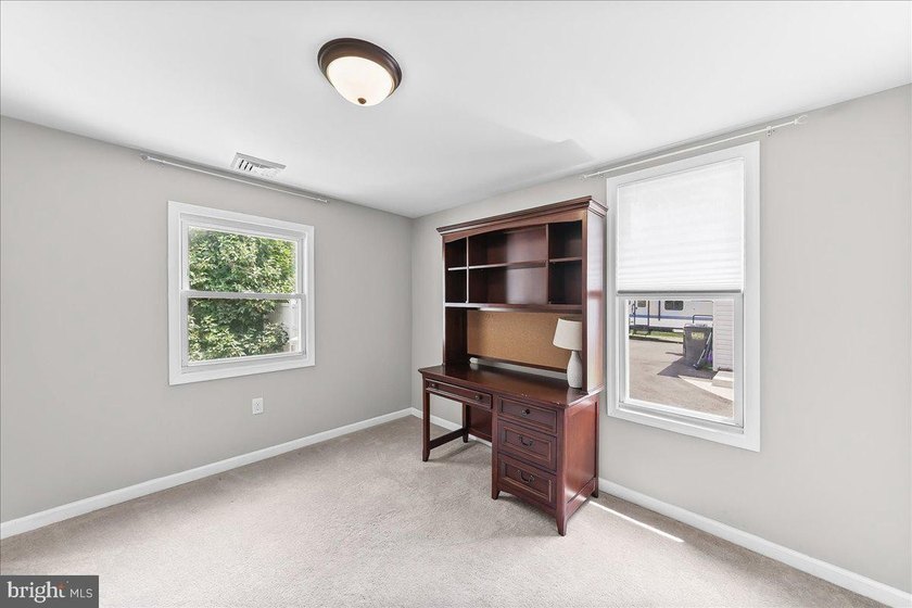 This charming bungalow offers a perfect blend of comfort and - photo 22