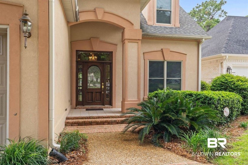 Welcome to this beautifully designed custom home in the highly - photo 5