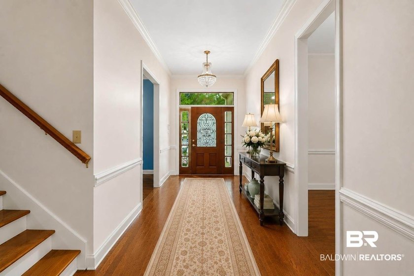 Welcome to this beautifully designed custom home in the highly - photo 6