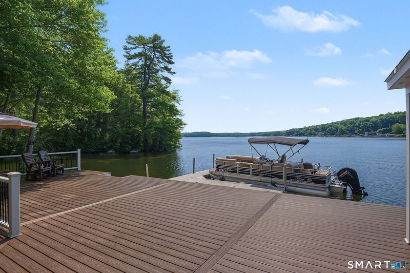 Welcome to Beach Pond's premier private waterfront estate. Set - photo 8