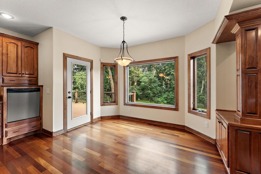 This inviting and spacious two-story home sits on an incredible - photo 15