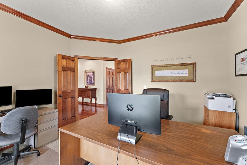 This inviting and spacious two-story home sits on an incredible - photo 18