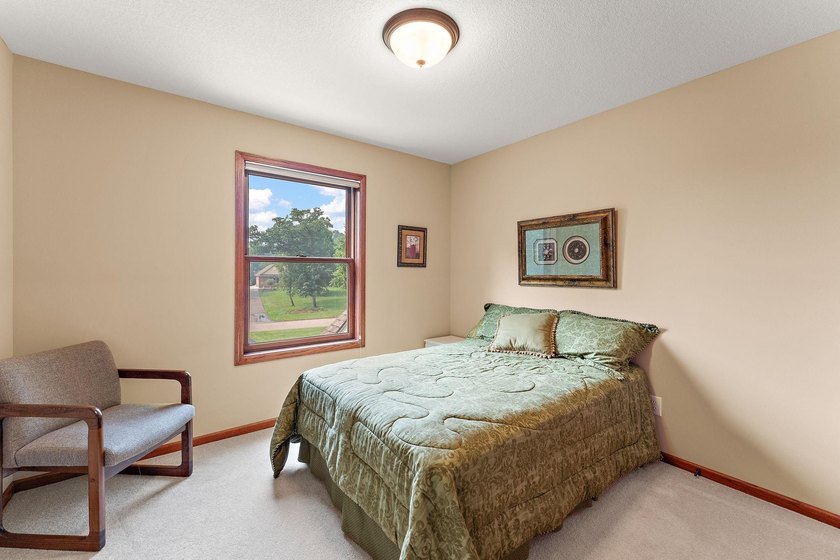 This inviting and spacious two-story home sits on an incredible - photo 25