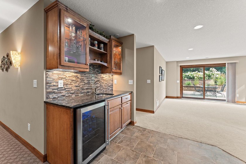 This inviting and spacious two-story home sits on an incredible - photo 34