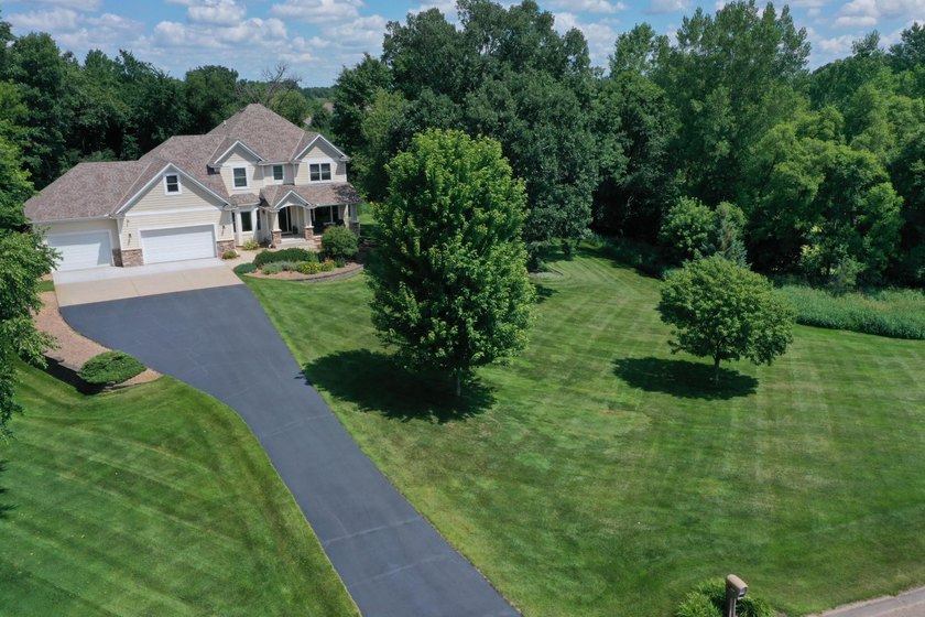 This inviting and spacious two-story home sits on an incredible - photo 46