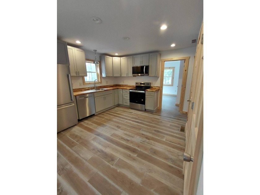 TAXES REDUCED!!!! Move right into this BRAND NEW home! Built - photo 6