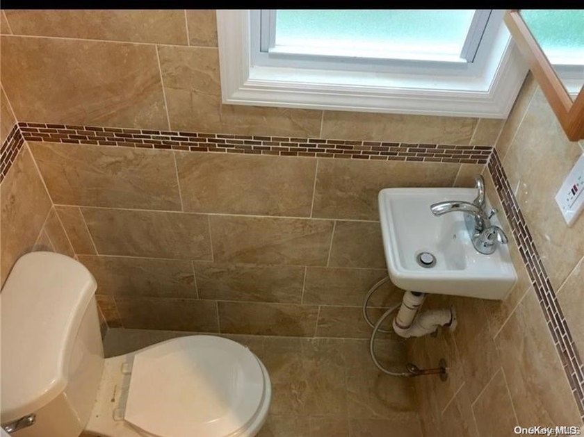 **SHORT SALE PENDING LENDER APPROVAL** Fully Renovated Corner - photo 7