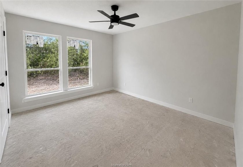 New construction on a wooded 0.65-acre lot in Lakewood Shores at - photo 11