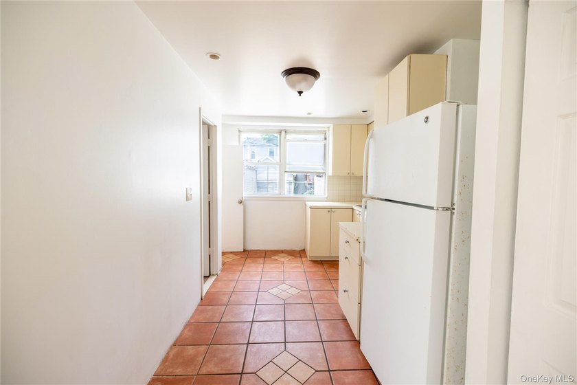 Don't miss your chance to own this legal two-family home - photo 7